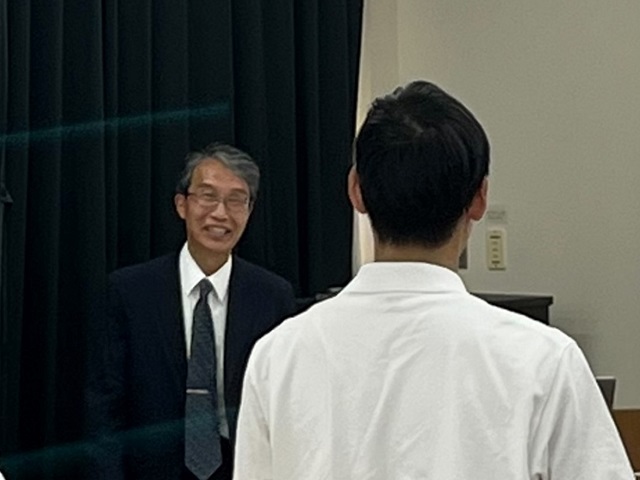 質疑を受ける森下監事（ 福島工業高等専門学校F-REIトップセミナー）